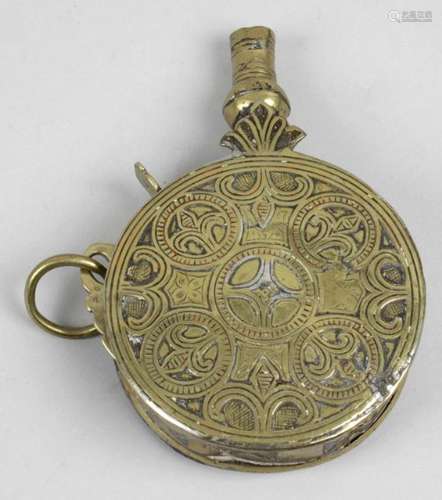 An antique eastern brass powder flask,