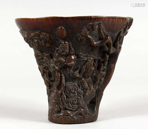 A CHINESE CARVED HORN LIBATION CUP. 5ins high.