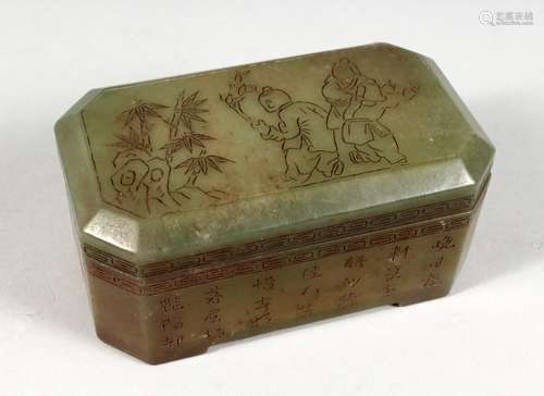 A CHINESE JADE BOX AND COVER, incised with figures and calligraphy. 5.5ins long.