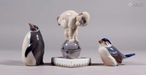 THREE SMALL COPENHAGEN PORCELAIN GROUPS, an infant faun on a sphere, 10cm high, Pattern 2218, a