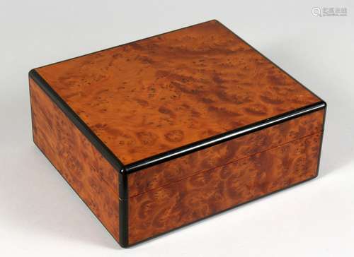 AN ELIE BLEU, PARIS BURR WOOD HUMIDOR. 9.75ins wide.