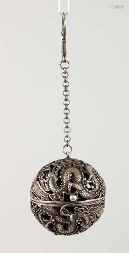 A CHINESE WHITE METAL PIERCED BALL CENSER. 2ins diameter.