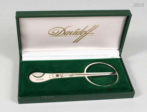 A DAVIDOFF SCISSOR ACTION CIGAR CUTTER, boxed.