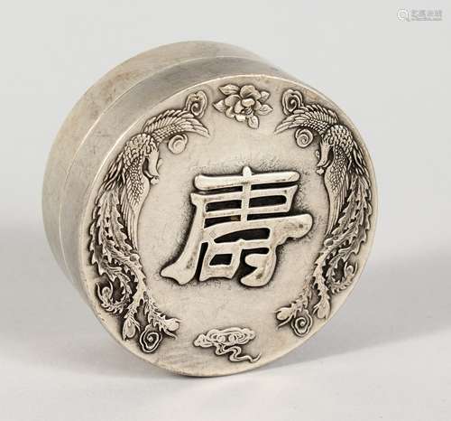 A CHINESE WHITE METAL CIRCULAR BOX. 2.5ins diameter.