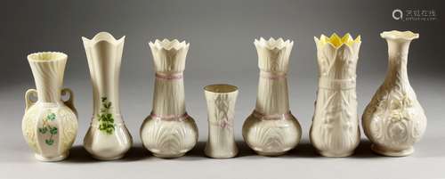 SEVEN VARIOUS IRISH BELLEEK VASES.