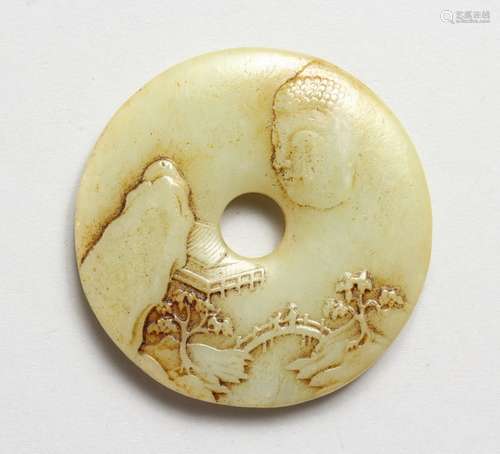 A SMALL CHINESE CARVED JADE BI DISC. 2.5ins diameter.