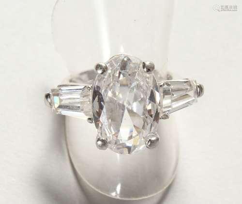 A SILVER AND CZ RING.