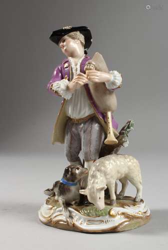 A GOOD MEISSEN PORCELAIN FIGURE OF A YOUNG MAN, playing pipes, a dog and lamb at his feet. Cross