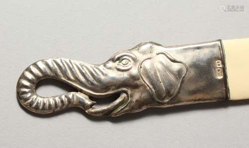 A SILVER ELEPHANT HEAD MOUNTED PAGE TURNER. 10.75ins long.