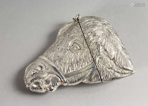 A NOVELTY SILVER-PLATE HORSE HEAD VESTA.