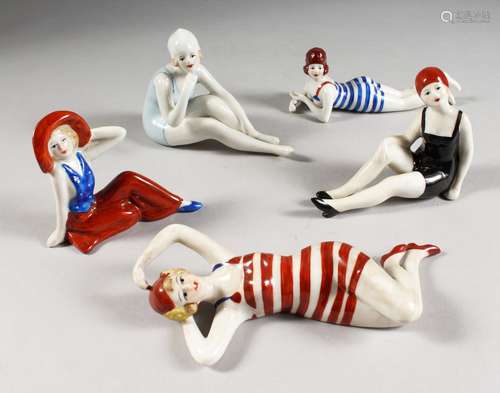 FIVE ART DECO DESIGN PORCELAIN LADY SWIMMERS.