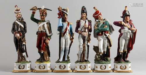 A SET OF SIX CONTINENTAL PORCELAIN MILITARY FIGURES. 11.5ins high.