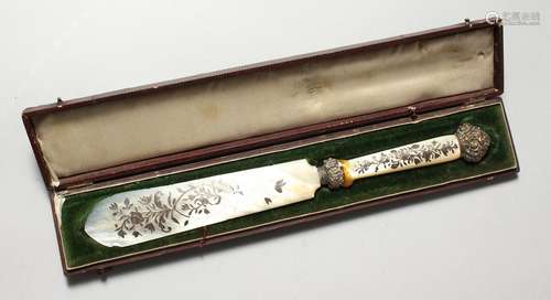 A MOTHER-OF-PEARL KNIFE.