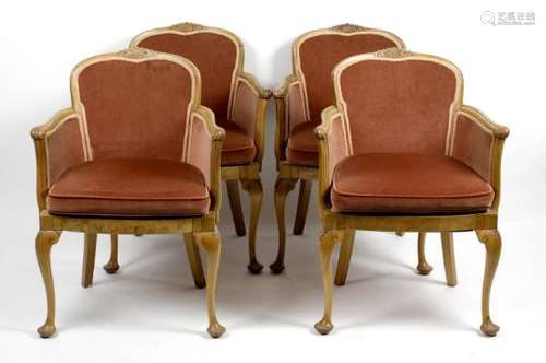 A set of four mid-20th century bleached walnut framed chairs,