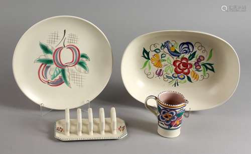 POOLE POTTERY, an oval shaped bowl, a circular plate painted with apples, a toast rack and a small