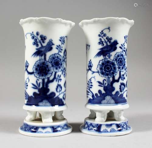 A SMALL PAIR OF MEISSEN PORCELAIN BLUE AND WHITE VASES, decorated with flowers and birds. Cross