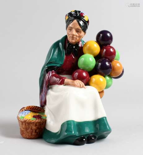 A ROYAL DOULTON FIGURINE. 