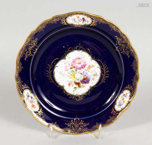 A GOOD MEISSEN PORCELAIN PLATE, rich blue ground edged in gilt, with bouquet of flowers and three