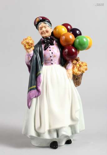 A ROYAL DOULTON FIGURINE, 