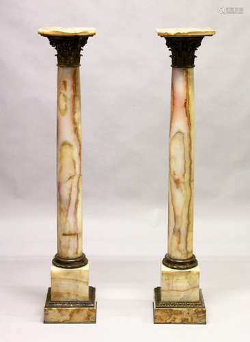 A SUPERB PAIR OF PERIOD MARBLE COLUMNS, with bronze capitals. 4ft high.