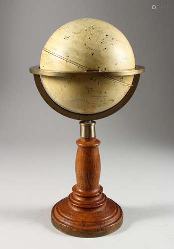 G. LECOQ. French, 19th century. A TABLE GLOBE OF THE STARS, 5.5ins diameter x 15ins high, on a stand