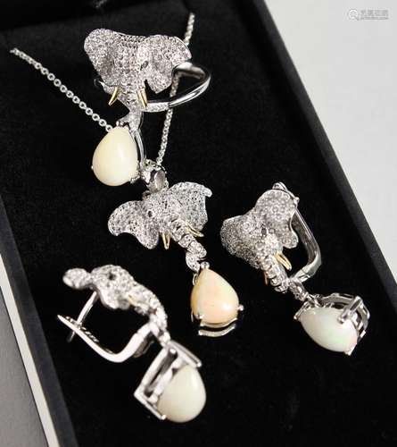 A SUITE OF ELEPHANT DESIGN , PENDANT, EARRINGS AND RING, set with opals.