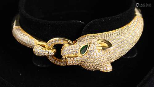 A SILVER AND GOLD-PLATED PANTHER BRACELET.