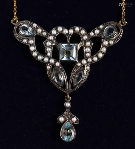 A 9CT GOLD AND SILVER, BLUE TOPAZ AND SEED PEARL PENDANT AND CHAIN.