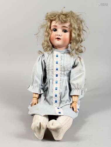 SIMON & HALBIG A GIRL DOLL, with porcelain head and segmented body. Mark SH, PB inside star, 914 8