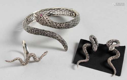 A SILVER AND MARCASITE SNAKE BRACELET, EARRINGS AND RING.