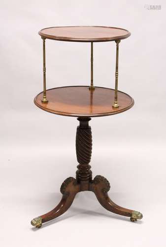 A GOOD REGENCY MAHOGANY CIRCULAR TWO TIER DUMB WAITER with turned brass column supports, the base