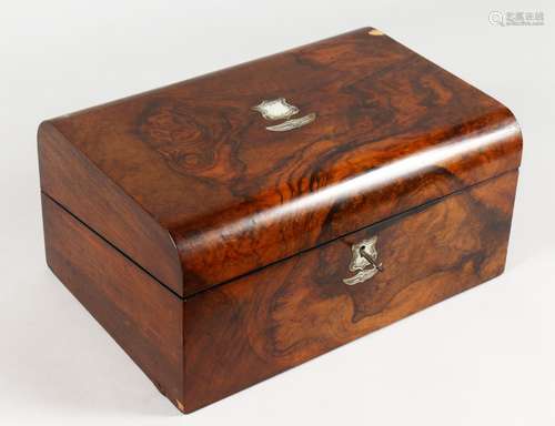 A VICTORIAN WALNUT DOMED TOP TRAVELLING WRITING DESK. 34.5cm wide.