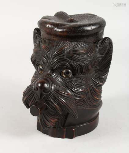 A LARGE BLACK FOREST CARVED WOOD DOG TOBACCO BARREL, smoking a cigarette. 7ins high.