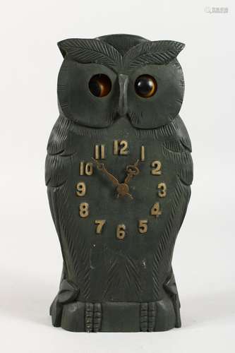 A CARVED WOOD AUTOMATON OWL CLOCK. 9.5ins high.