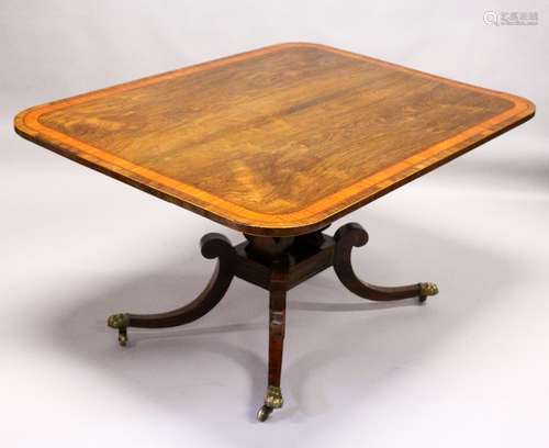 A REGENCY ROSEWOOD AND SATINWOOD BANDED TILT TOP BREAKFAST TABLE, with rounded rectangular top,