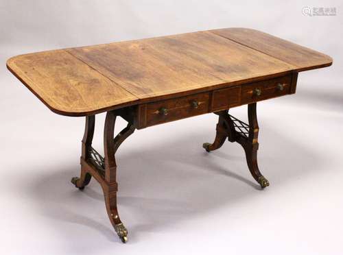 A REGENCY ROSEWOOD SOFA TABLE, with rounded rectangular top, two real and two dummy frieze