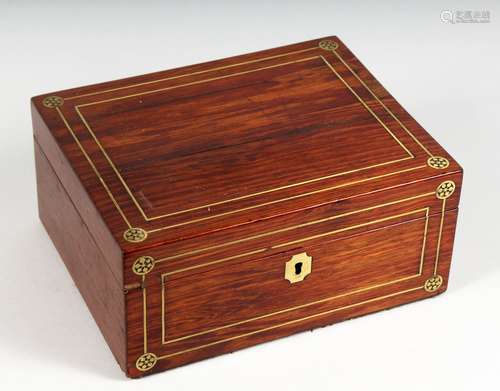 A VICTORIAN MAHOGANY BOX, with brass inlaid decoration. 9.75ins wide.