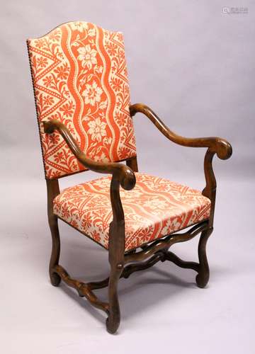 A 20TH CENTURY CONTINENTAL BEECH FRAMED OPEN ARMCHAIR, with floral printed upholstered back and