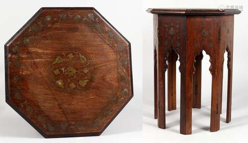 A SMALL EASTERN BRASS INLAID OCTAGONAL HARDWOOD STAND. 12ins wide x 16ins high.