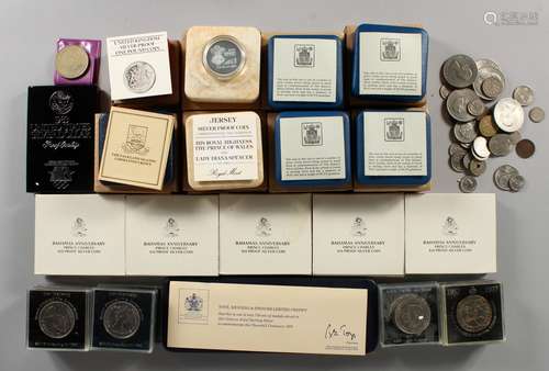 A QUANTITY OF ROYAL COMMEMORATIVE AND OTHER COINS, contained in a black Japanned tin trunk.