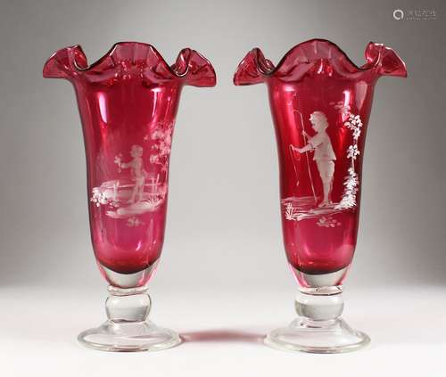 A LARGE PAIR OF CRANBERRY MARY GREGORY VASES. 14ins high.