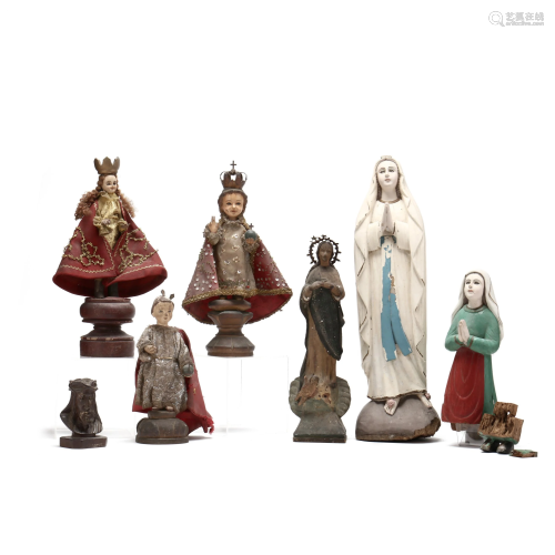 Group of Seven Religious Santos Sculptures