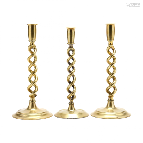 Three Antique English Brass Barley Twist Candlesticks