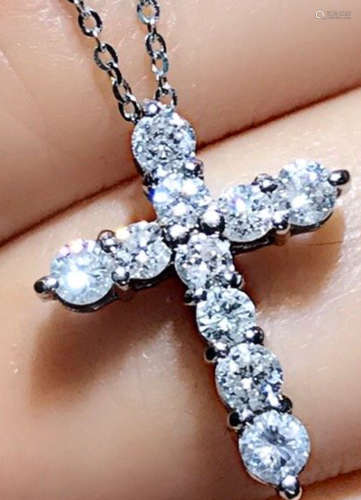 A 18K/PT900 WITH DIAMOND CROSS SHAPED NECKLACE