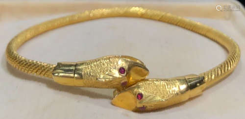 A 24K GOLD&RUBY SNACK SHAPED BANGLE