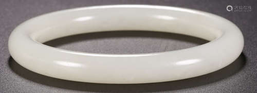 A HETIAN JADE CARVED BANGLE