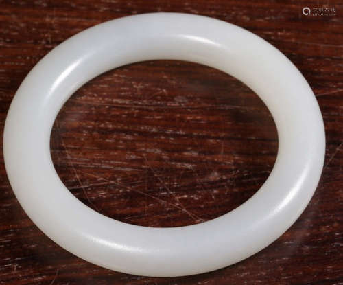 A HETIAN JADE CARVED PLAIN SURFACE BANGLE