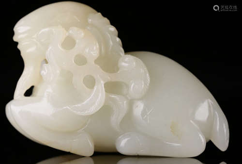 A HETIAN JADE CARVED GOAT SHAPED PENDANT