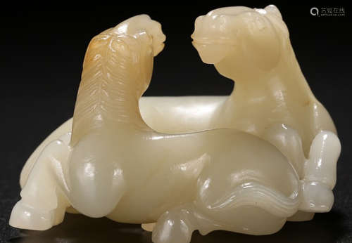 A HETIAN JADE CARVED HORSE SHAPED PENDANT