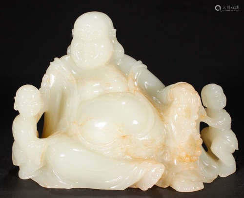 A HETIAN JADE CARVED MAITREYA STATUE